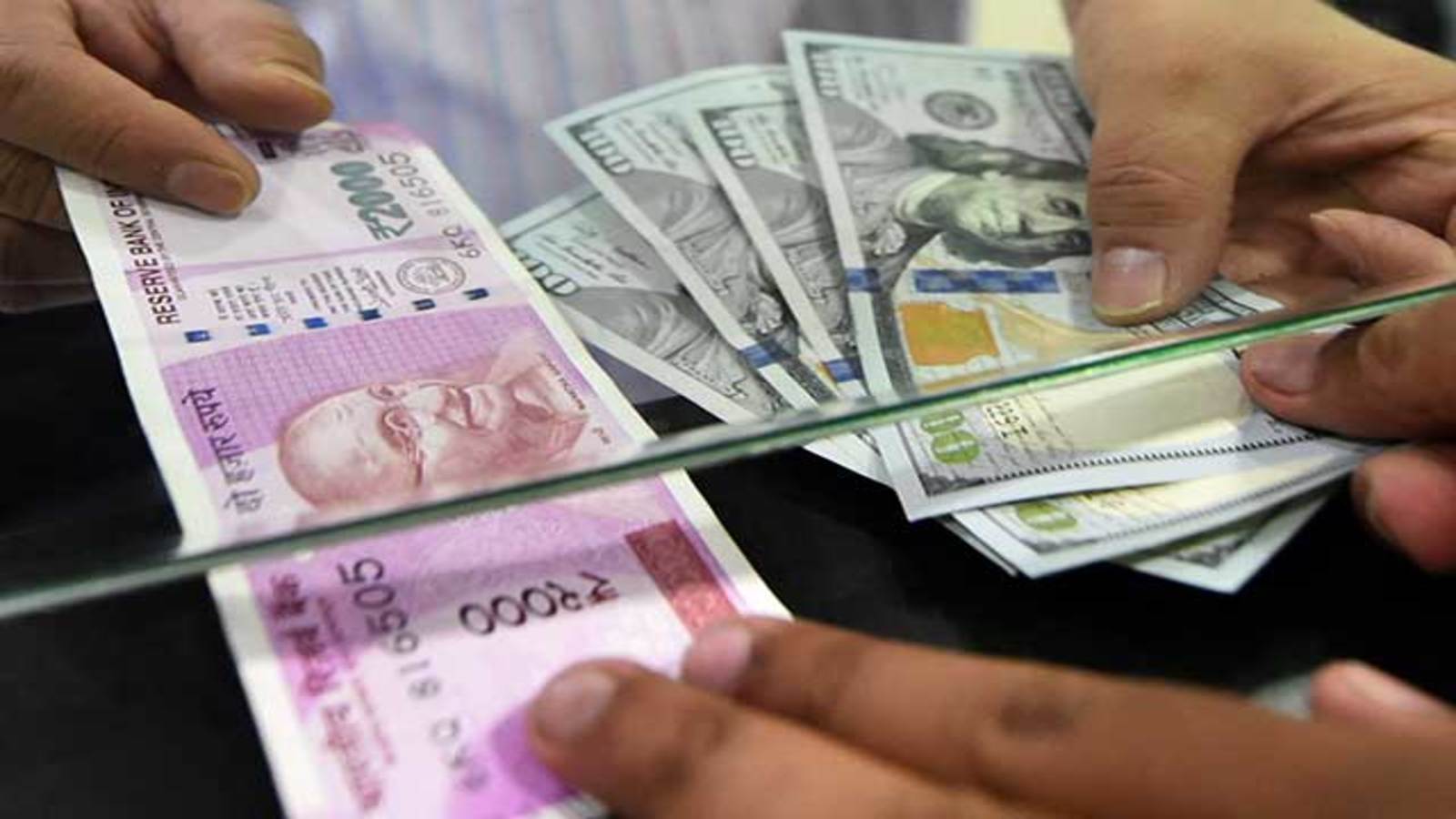 Customer being served at forex counter